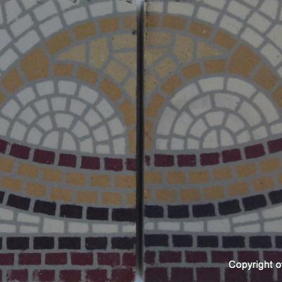 A unique period mosaic themed ceramic with double borders