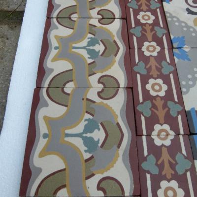 A small antique Belgian ceramic floor with two borders