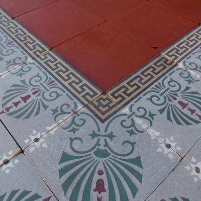 A 10.5m2+ antique French ceramic floor with back to back borders