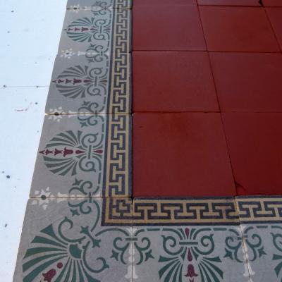 A 10.5m2+ antique French ceramic floor with back to back borders