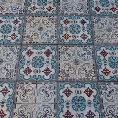 A small, 5m2, three motif antique French ceramic