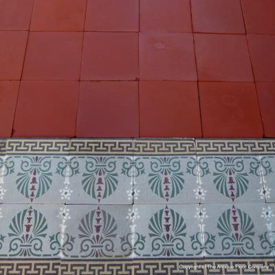 A 10.5m2+ antique French ceramic floor with back to back borders