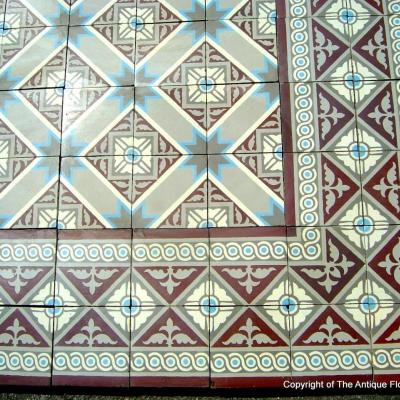 A French Winckelmans ceramic floor with same size borders