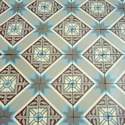 A French Winckelmans ceramic floor with same size borders