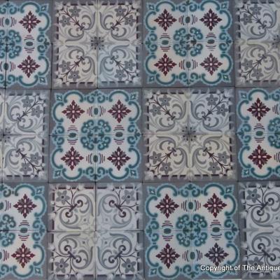 A small, 5m2, three motif antique French ceramic