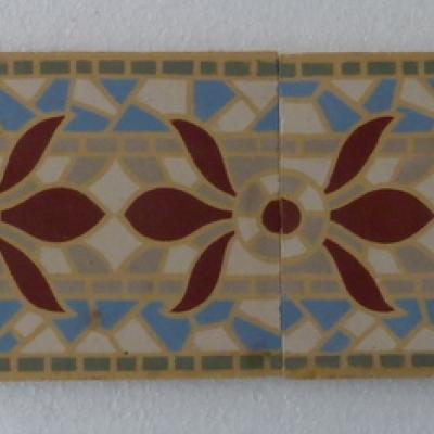 A run of 70+ faux mosaic themed ceramic border tiles 