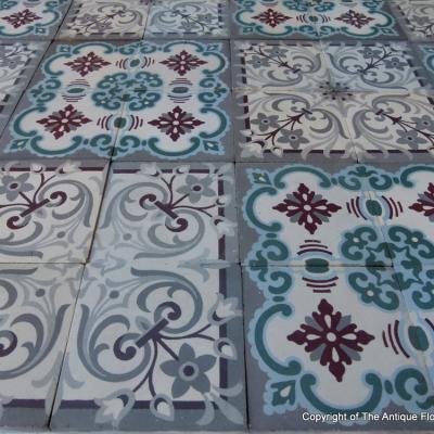 A small, 5m2, three motif antique French ceramic