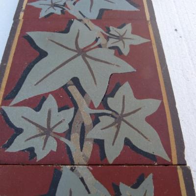 Early 20th century Boch Freres vine themed border tiles