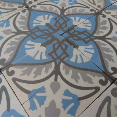 A small, 4.7m2 Belgian ceramic floor with its original borders - 1933