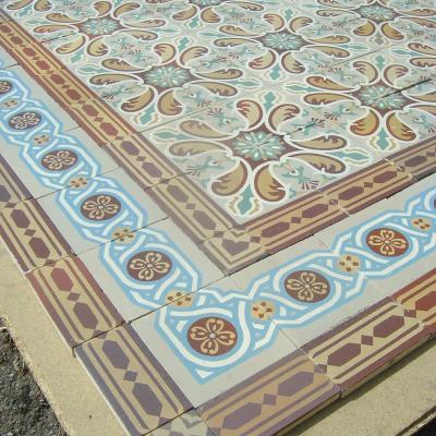 Antique French ceramic floor c.1915 - richly stylised in warm reds