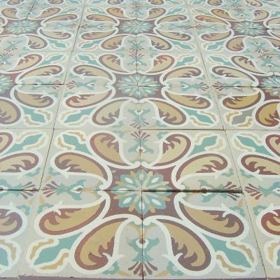 Antique French ceramic floor c.1915 - richly stylised in warm reds