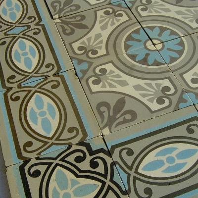 A 32m2+ / 350 sq ft antique ceramic floor in mid grey, blue and cream