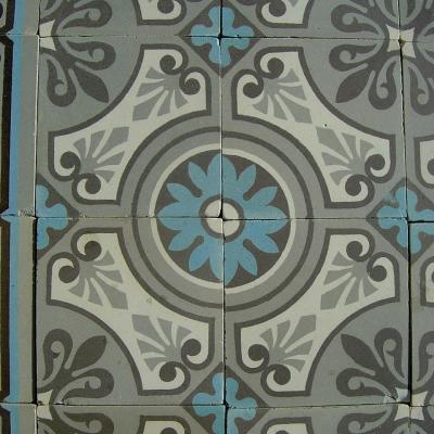 A 32m2+ / 350 sq ft antique ceramic floor in mid grey, blue and cream