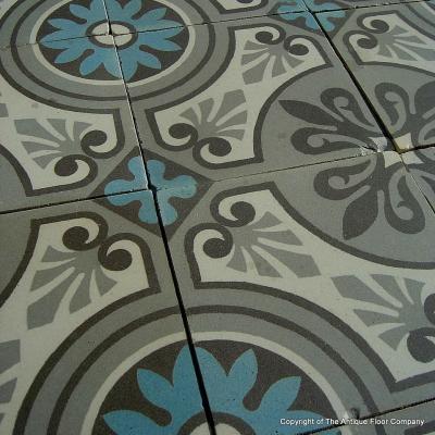 A 5m2 antique French ceramic floor in a cool palette