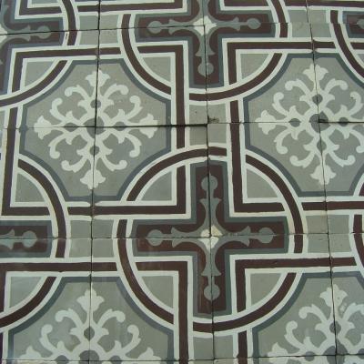 c.12m2 / 130 sq ft geometric floor with leaf borders