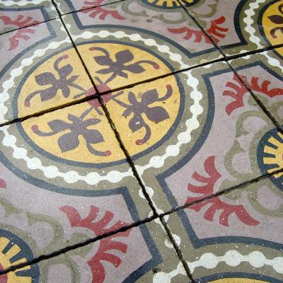 c.7m2 of carreaux de ciments tiles in mustard and lilac c.1910