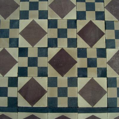 Small harlequin themed antique carreaux de ciments floor c.1910