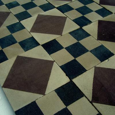 Small harlequin themed antique carreaux de ciments floor c.1910