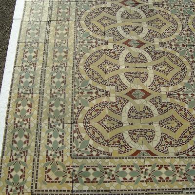 Large ornate mosaic themed ceramic encaustic floor with four borders