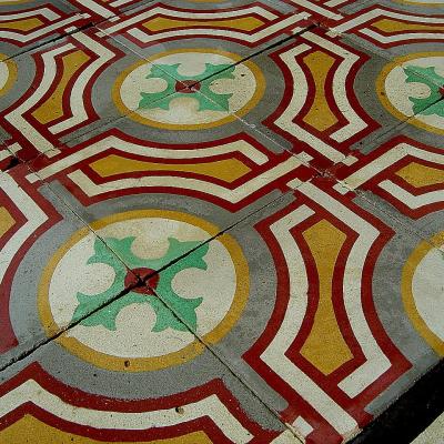 Small but bold French antique carreaux de ciments floor with a rich patina c.1900