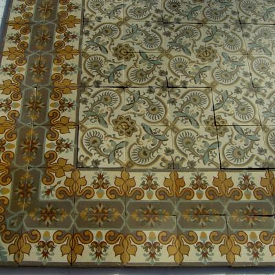 A small 3m2 art nouveau French ceramic floor with double borders 