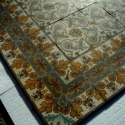 A small 3m2 art nouveau French ceramic floor with double borders 