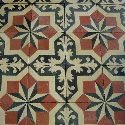 A regal antique Belgian carreaux de ciment floor, early 20th century