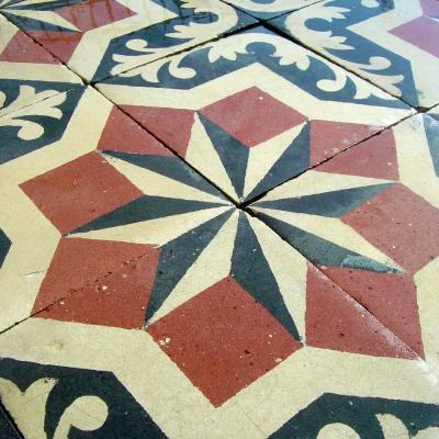 A regal antique Belgian carreaux de ciment floor, early 20th century