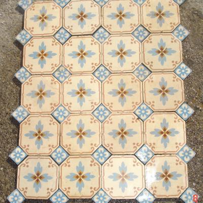 Pretty octagonal antique tiles with floral inserts