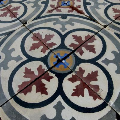 Small antique French carreaux de ciment floor with rich patina c.6m2