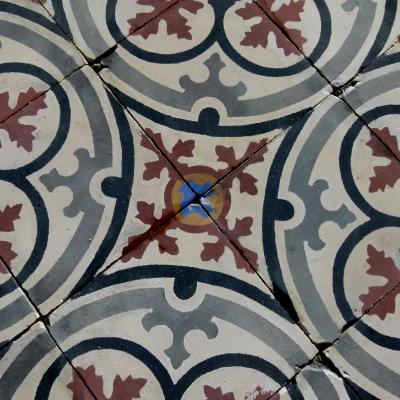 Small antique French carreaux de ciment floor with rich patina c.6m2