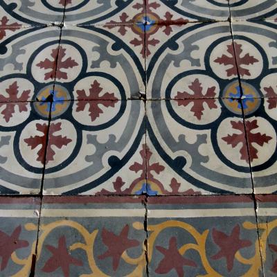 Small antique French carreaux de ciment floor with rich patina c.6m2