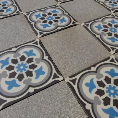 1930’s French ceramic floor with ornate double border