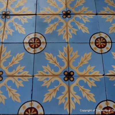 A quality c.24m2 antique ceramic floor with original borders produced by Douvrin c.1900