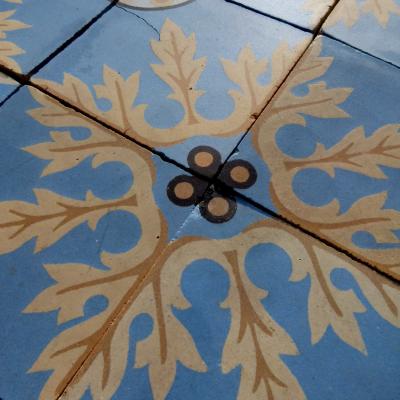 A quality c.24m2 antique ceramic floor with original borders produced by Douvrin c.1900