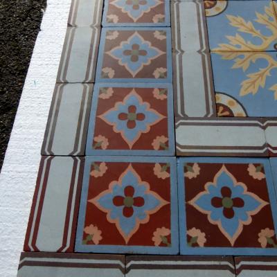 A quality c.24m2 antique ceramic floor with original borders produced by Douvrin c.1900