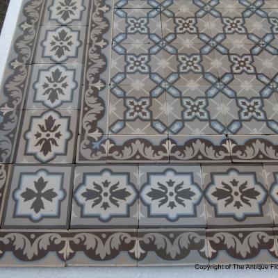 A large, 27.5m2+ classically geometric French ceramic floor with original triple borders