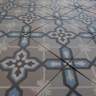 An 8.2m2+ antique ceramic floor with double and single borders