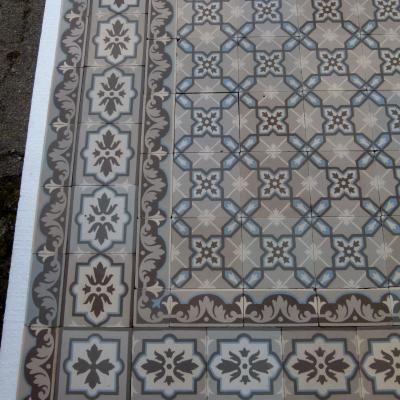 An 8.2m2+ antique ceramic floor with double and single borders