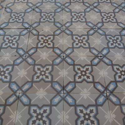 An 8.2m2+ antique ceramic floor with double and single borders