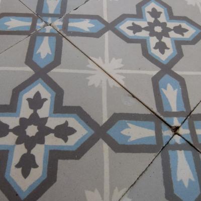 An 8.2m2+ antique ceramic floor with double and single borders