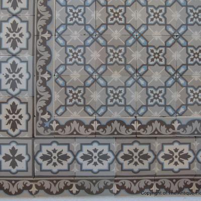 A large, 27.5m2+ classically geometric French ceramic floor with original triple borders