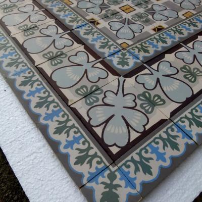 Beautiful and unusual clover themed antique ceramic floor