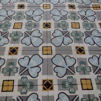 Beautiful and unusual clover themed antique ceramic floor