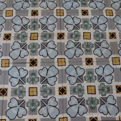 Beautiful and unusual clover themed antique ceramic floor