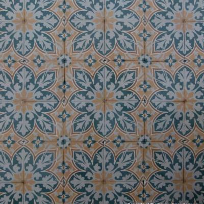 An 11.5m2+ vegetal themed antique French ceramic floor with triple borders