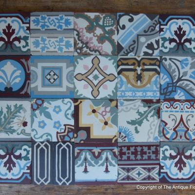 Patchwork of 20 antique French and Belgian ceramic tiles