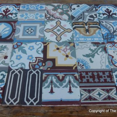 Patchwork of 20 antique French and Belgian ceramic tiles