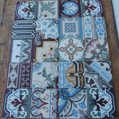 Patchwork of 20 antique French and Belgian ceramic tiles