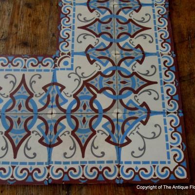 Large run of ceramic back to back art nouveau border tiles